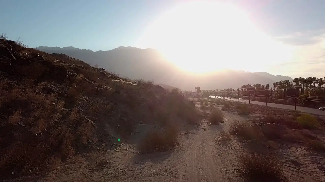 Wedding couple beautiful young bride and groom then flying upwards reveling Californian landscape