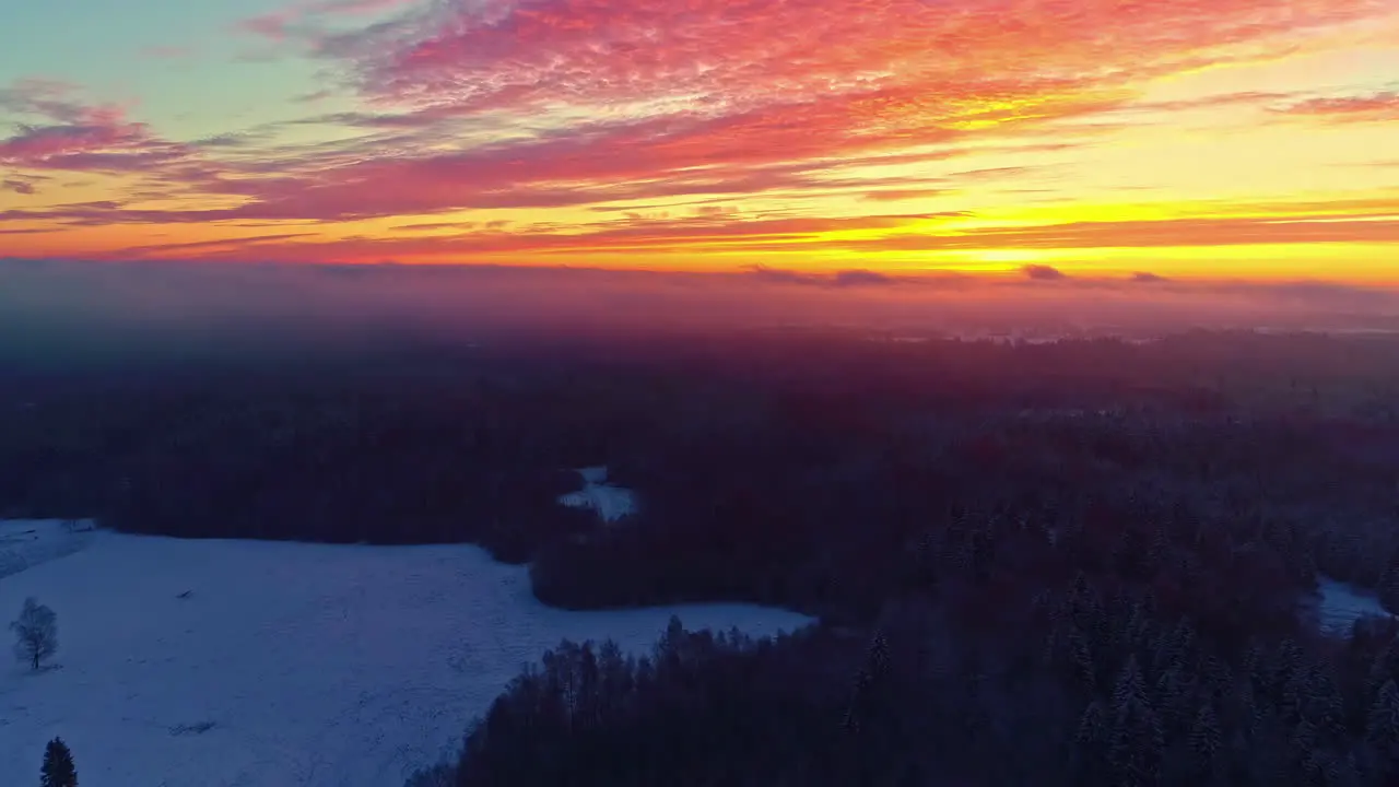 Aerial View of Magical Orange Sunset Skyline Above