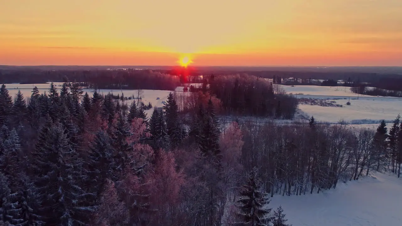 Aerial View of Sunset Above Idyllic WInter Landscape