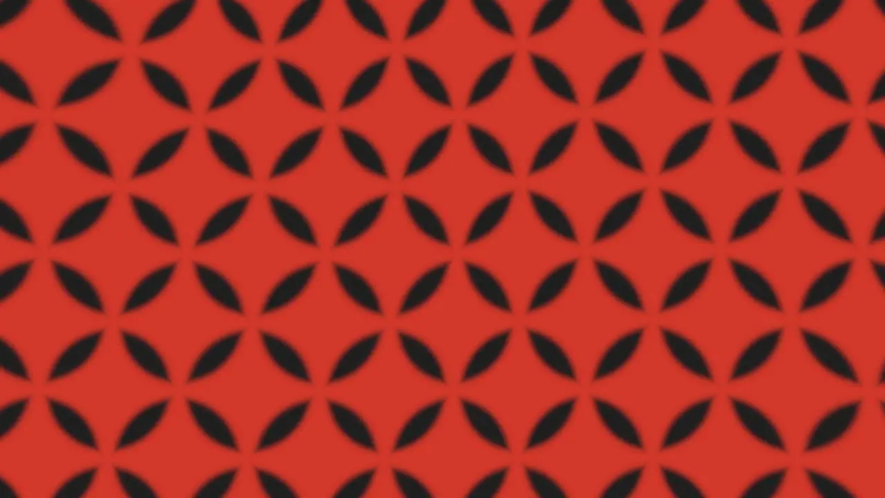 Symmetrical black and red grid pattern with repeating squares and rectangles