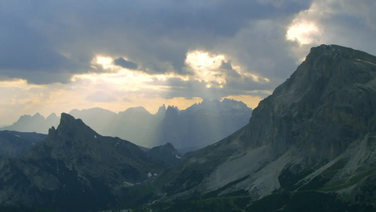 Breathtaking Sunset Golden Hour Sun Rays in Italy Dolomites Mountains Aerial