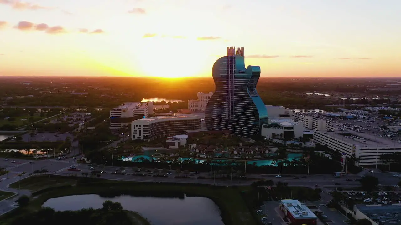 Aerial view towards the Seminole Hard Rock Hotel during sunset approaching drone shot