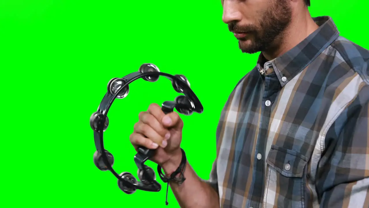 Male musician playing hand percussion