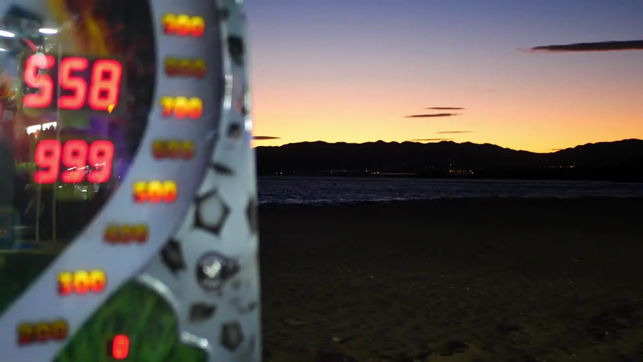 Arcade machine at the beach during a fair in Bolnuevo Spain