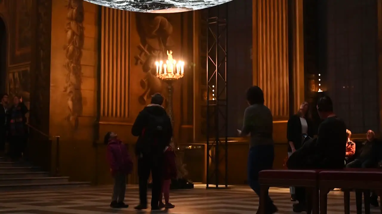 Children looking to the Moon within the Old Royal Naval College Greenwich London United Kingdom