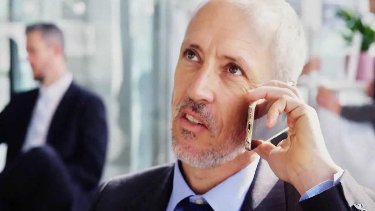 Businessman talking on mobile phone