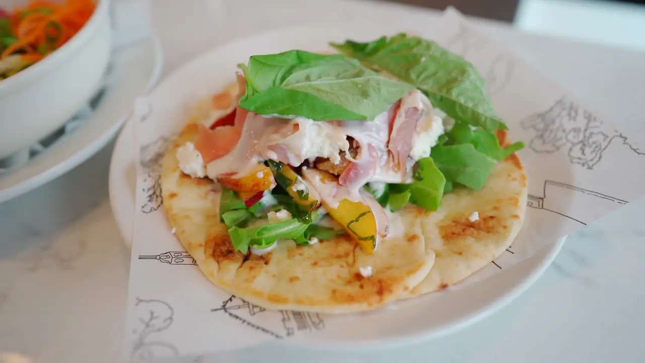 Taco on plate indoors in restaurant