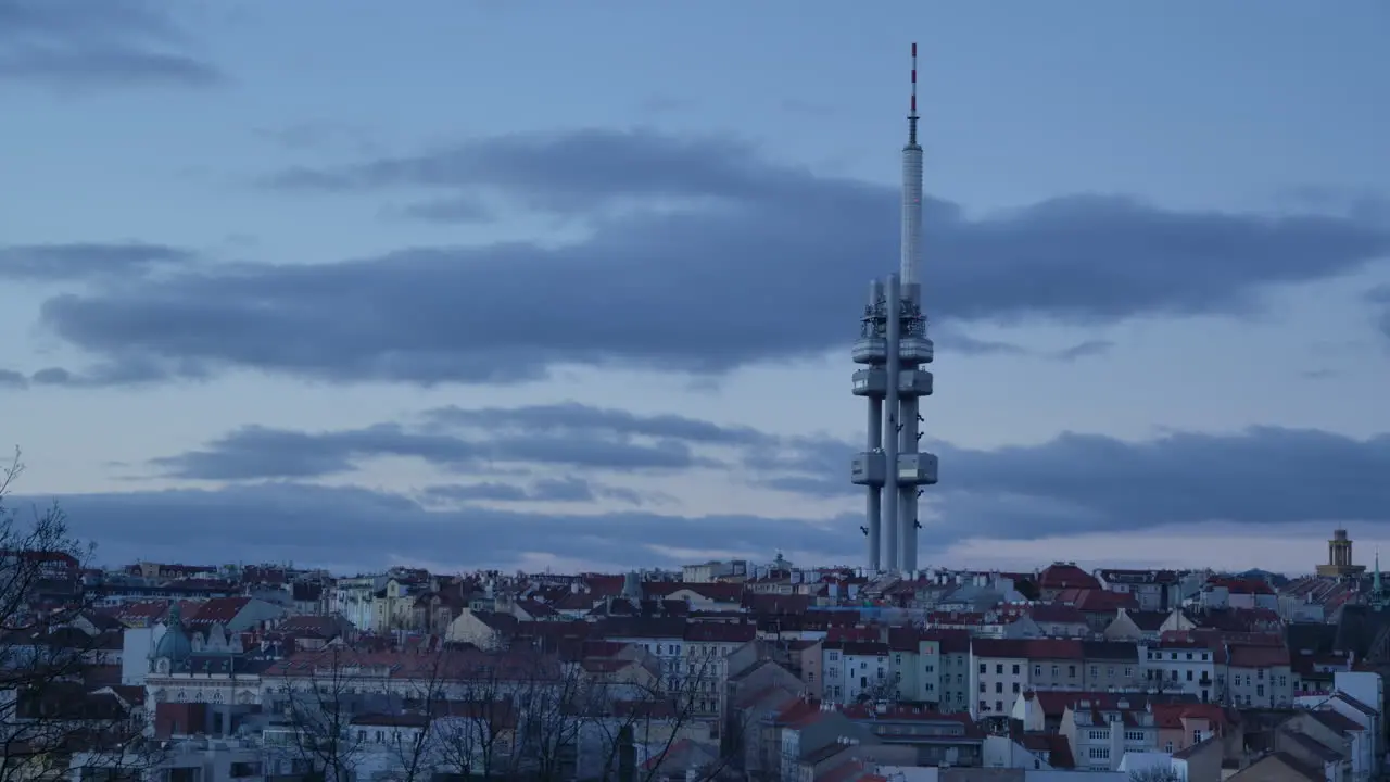 Timelapse of the Žižkov Television Tower in prague during sunrise with cloudy sky