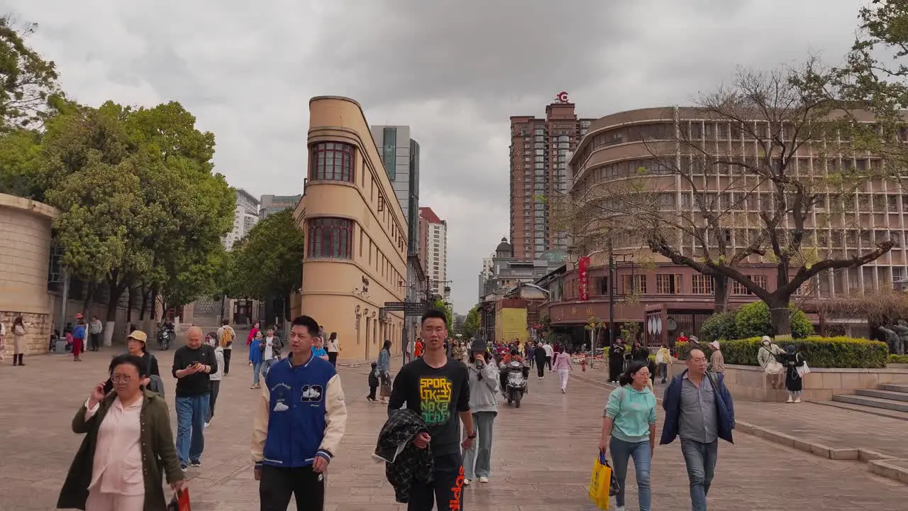 Kunming Anti-Japanese War Memorial Hall with Tourists walking in the street