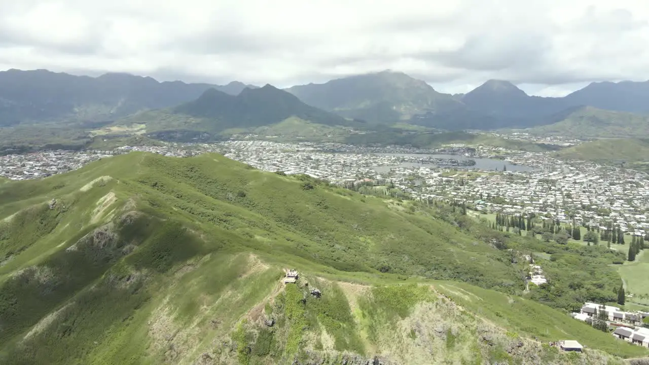 Mountain range with city and mountains in the background on a tropical island