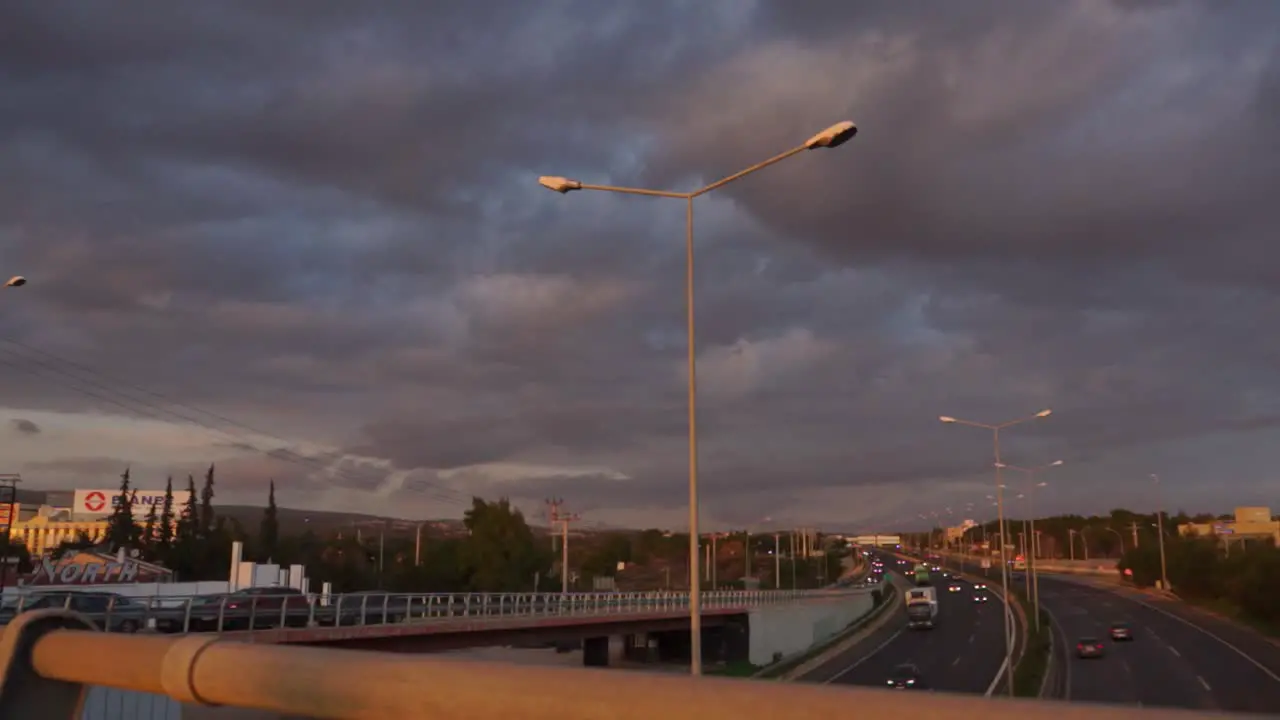 Pan shot of national highway of Greece taken from Varympompi bridge intersection on a cloudy day