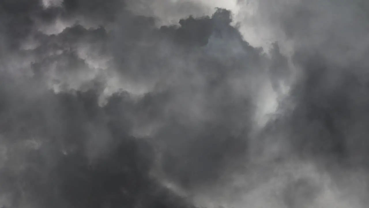 dark Clouds With Lightning At Night Sky