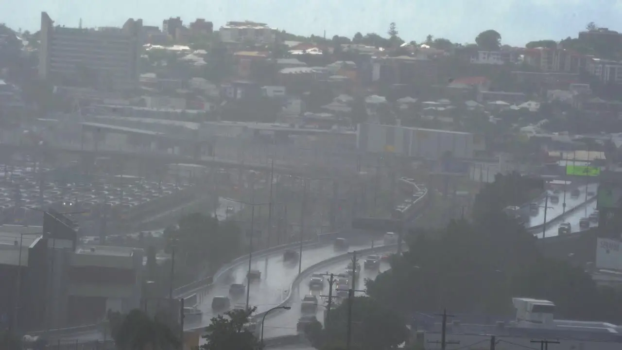 Flood warning issued as storms smash southeast Queensland severe weather heavy rainfall wild summer season has arrived Brisbane city Australia blurry vision