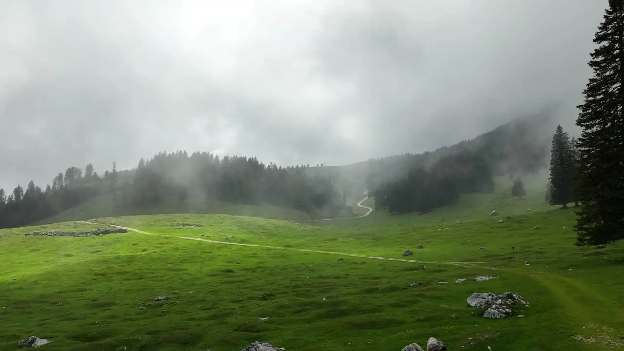 Stormy Foggy Skyline Aerial Above Green Cinematic Horror Hills European Countryside of Slovenia Pungart Establishing Intro Shot