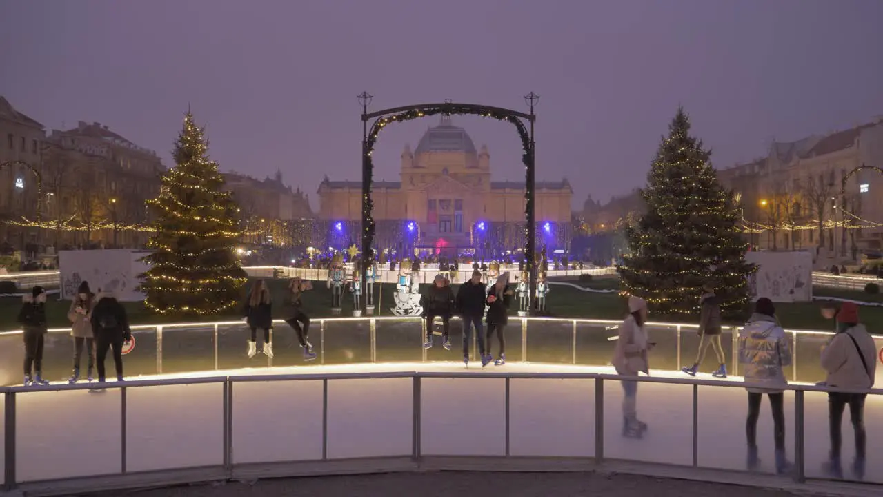 People Ice Skating On A Outdoor Public Rink