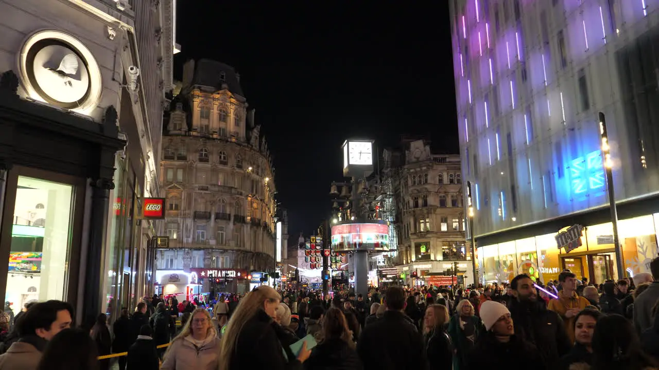 Piccadilly Circus crowded on cold night London Static