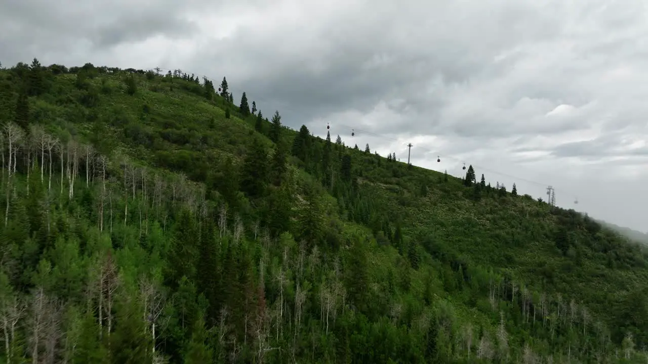 Aerial of low fog hanging over mountain and forest trees-6