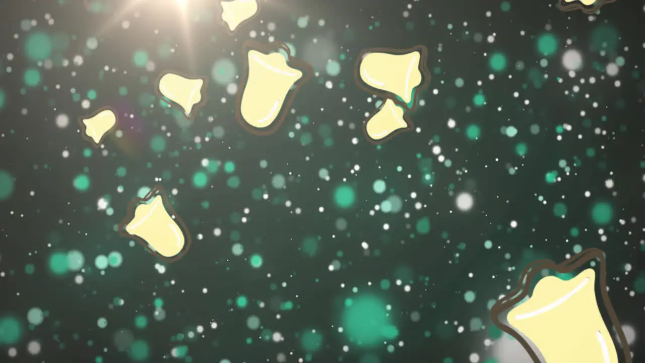 Animation of christmas bell icons falling against spots of light on blue background with copy space