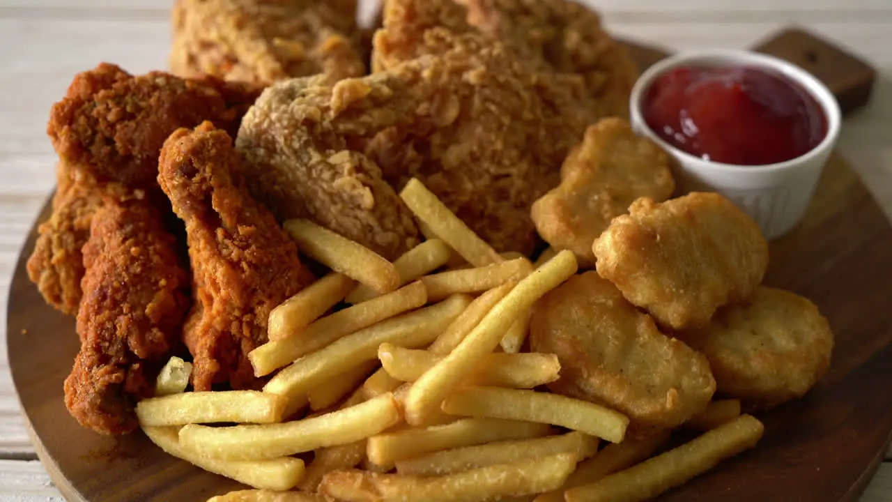 fried chicken with french fries and nuggets