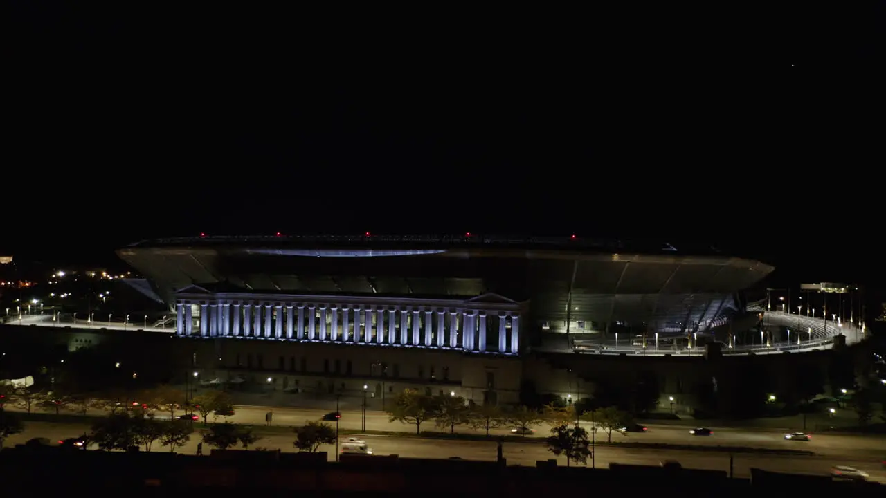 Drone Shot Reveals Historic Soldier Field Columns at Night and Full Stadium in the Windy City