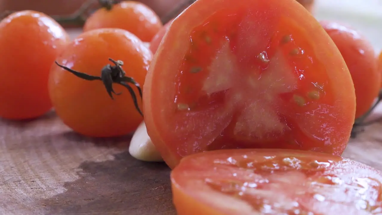 Sliced Tomato On Cutting Board slowly move backward