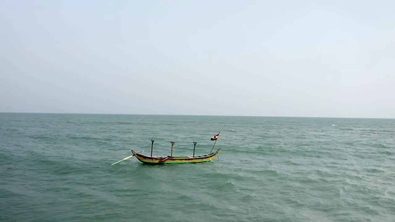 Boat with flag on sea