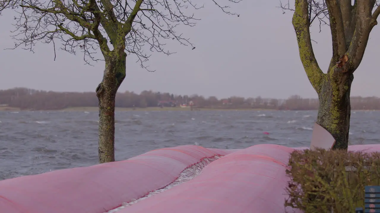 Water tubes have been deployed to protect nearby properties from the flooding after a storm