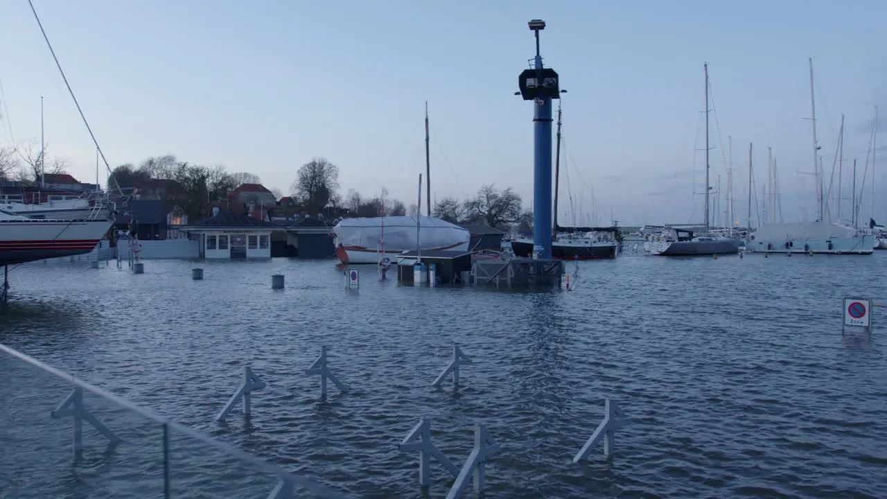 Flooding of the harbor after the storm named Pia caused the water levels to rise almost two meters above normal