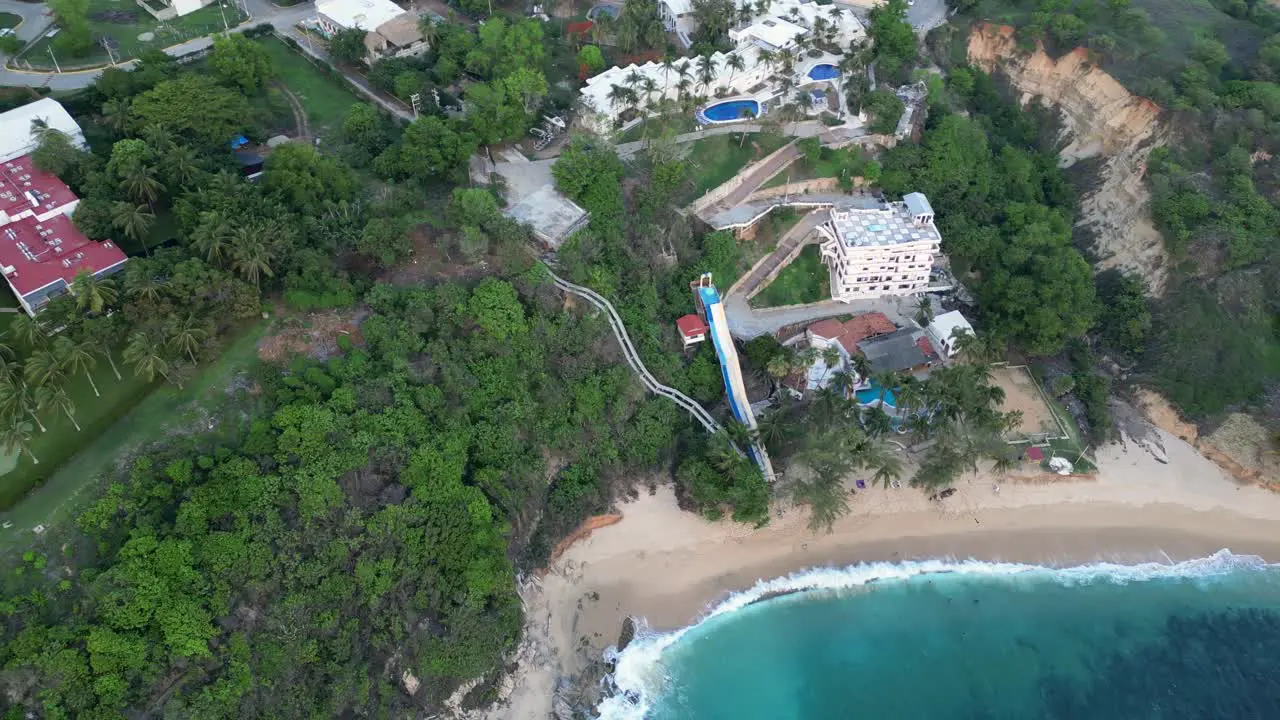 Coral Beach drone video its lush vegetation and natural  along with the residences and hotels perched on the surrounding mountains at Puerto Escondido Oaxaca Mexico