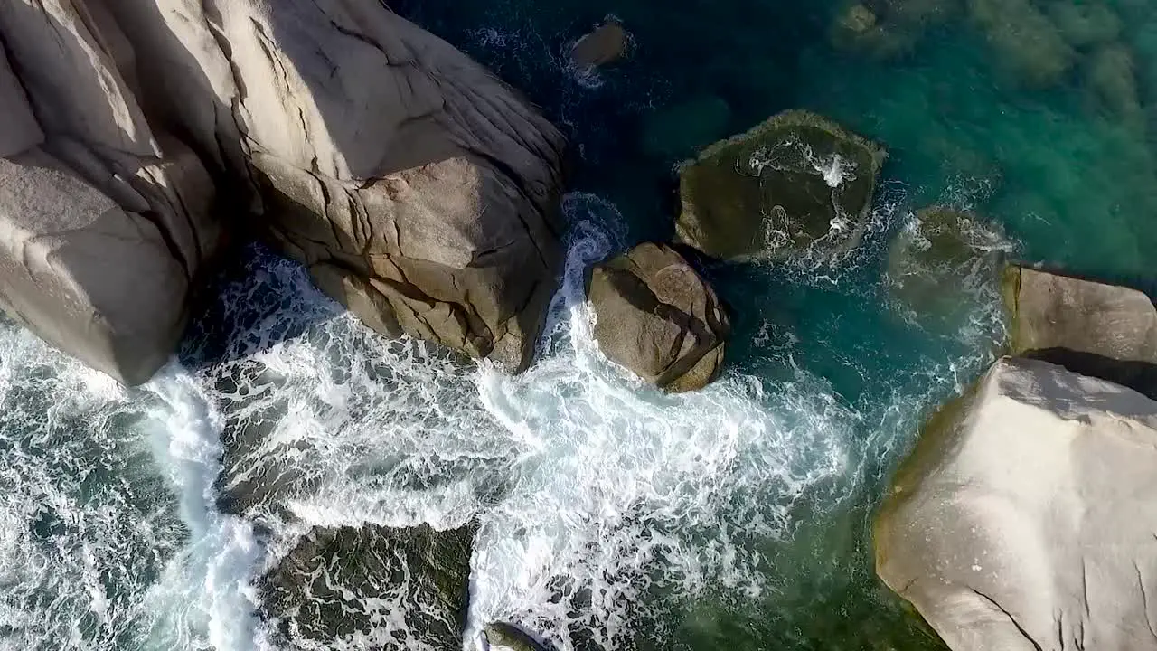 Tide wave slap and washout rocks back and forth near gulf shore at noon overlook crane
Filmed in Thailand Koh Tao Island