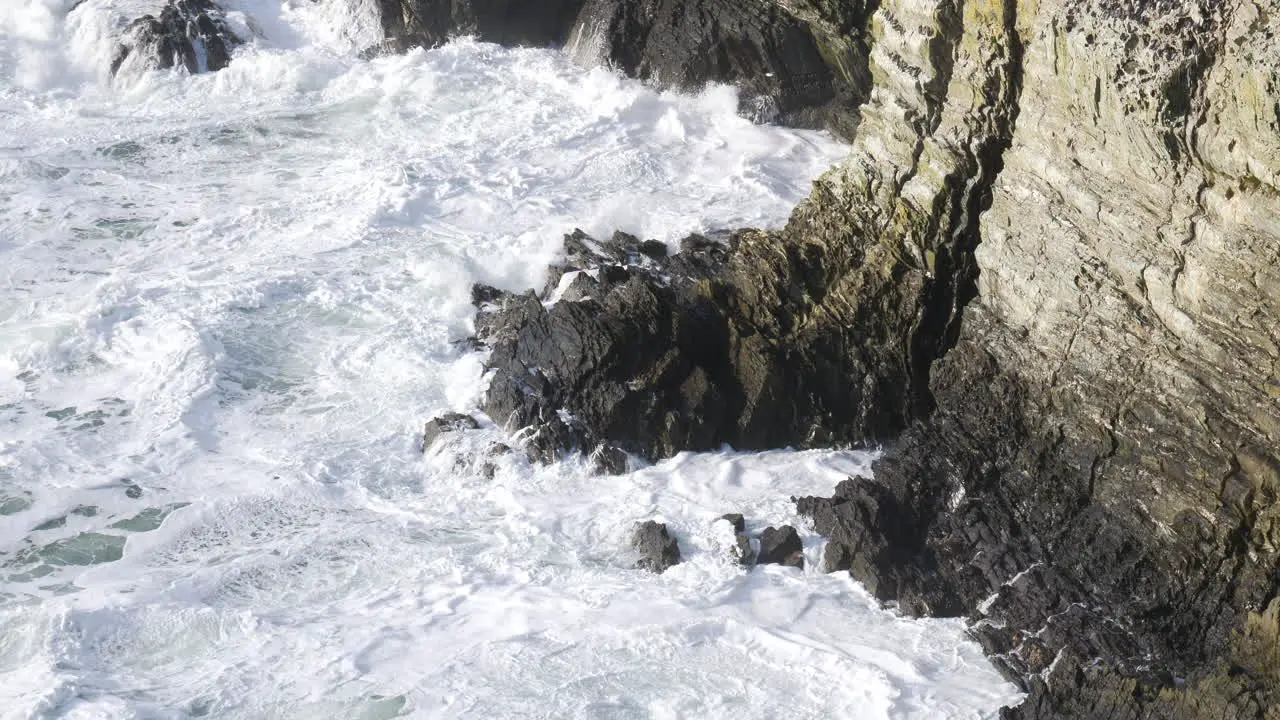 Turbulent Ocean Waves Against Cliff Slow Motion