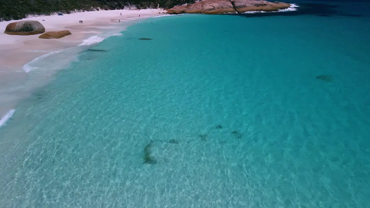 Incredible location aerial of crystal clear turquoise waters of little beach Western Australia located on two peoples bay