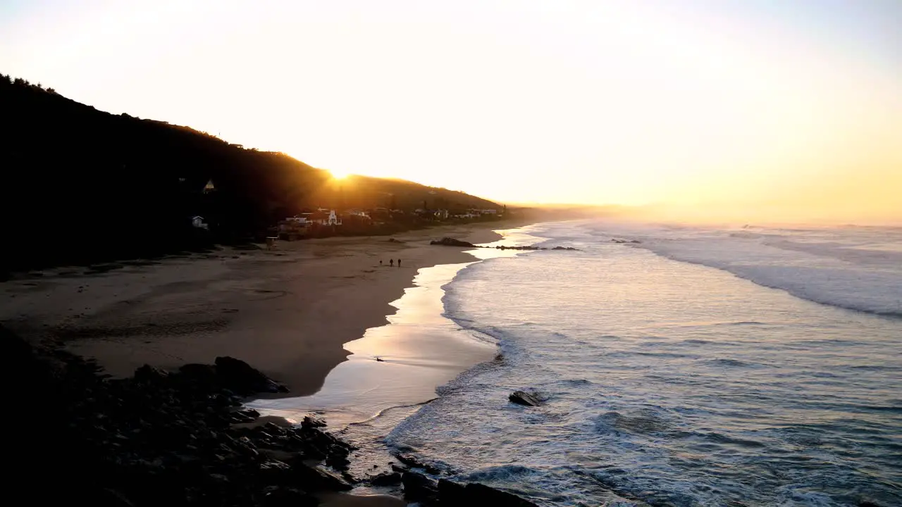 Sunrise over the wide stretch of beach of Wilderness South Africa