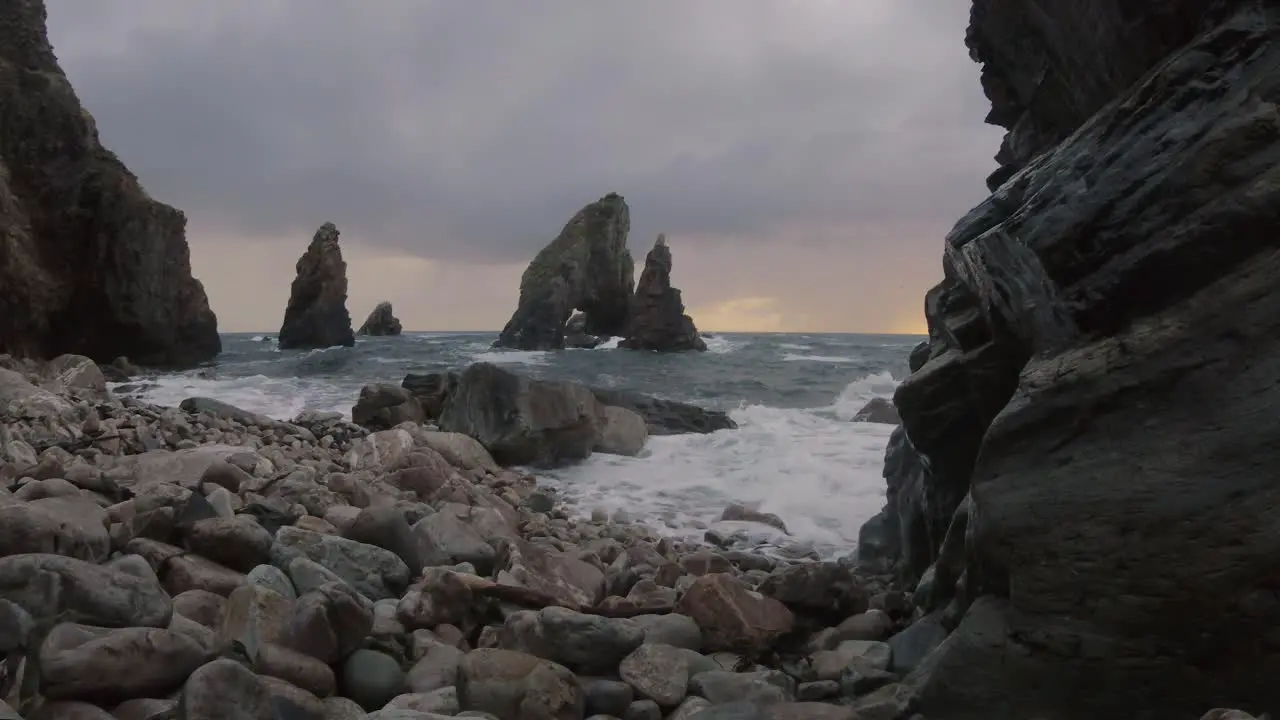 Crohy Head in Donegal Ireland ocean wave on rocks in sunset