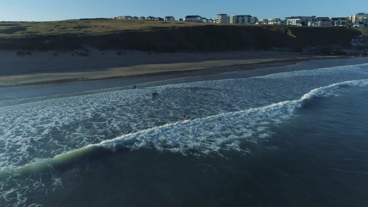 Arial shot of surfers in Cornwall