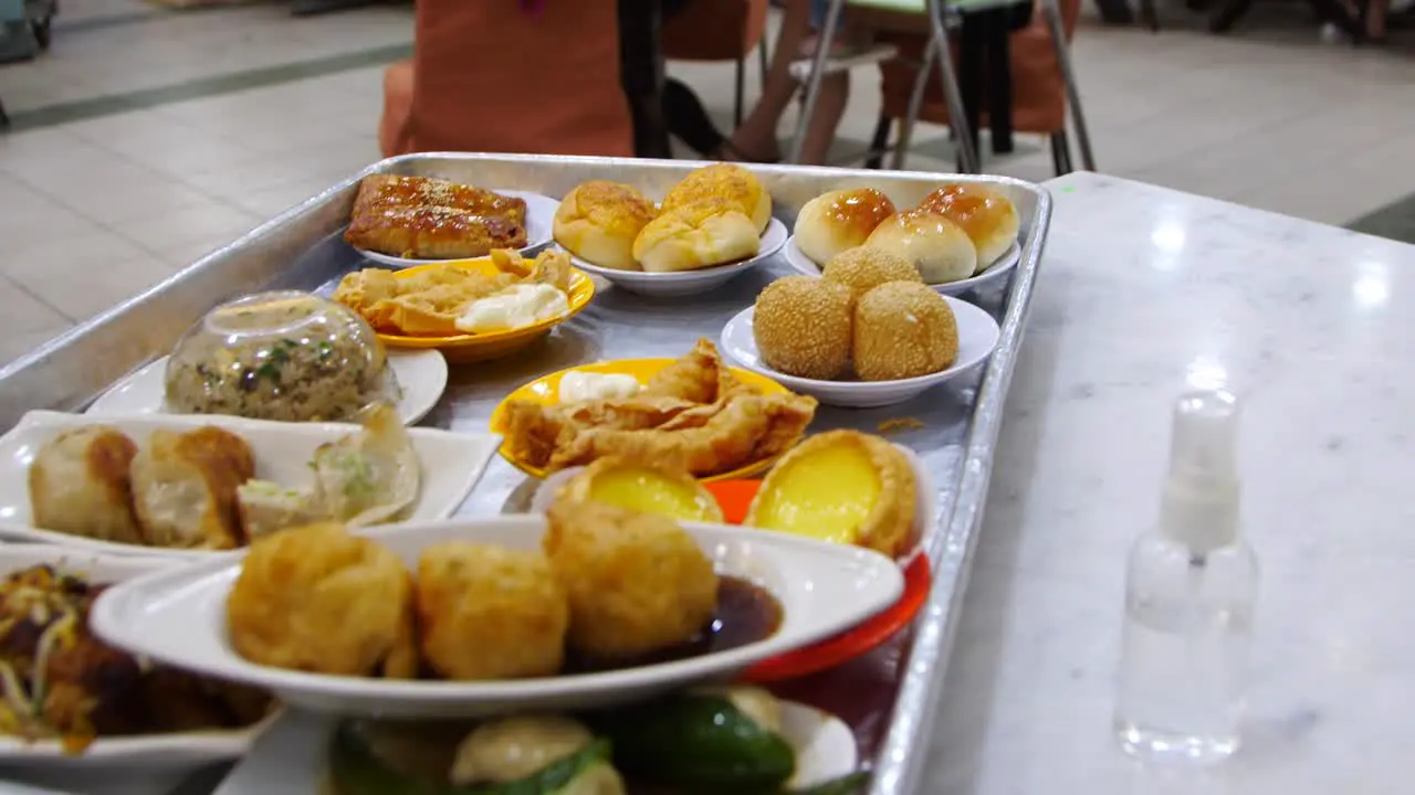 an assortment of dim sum on a tray