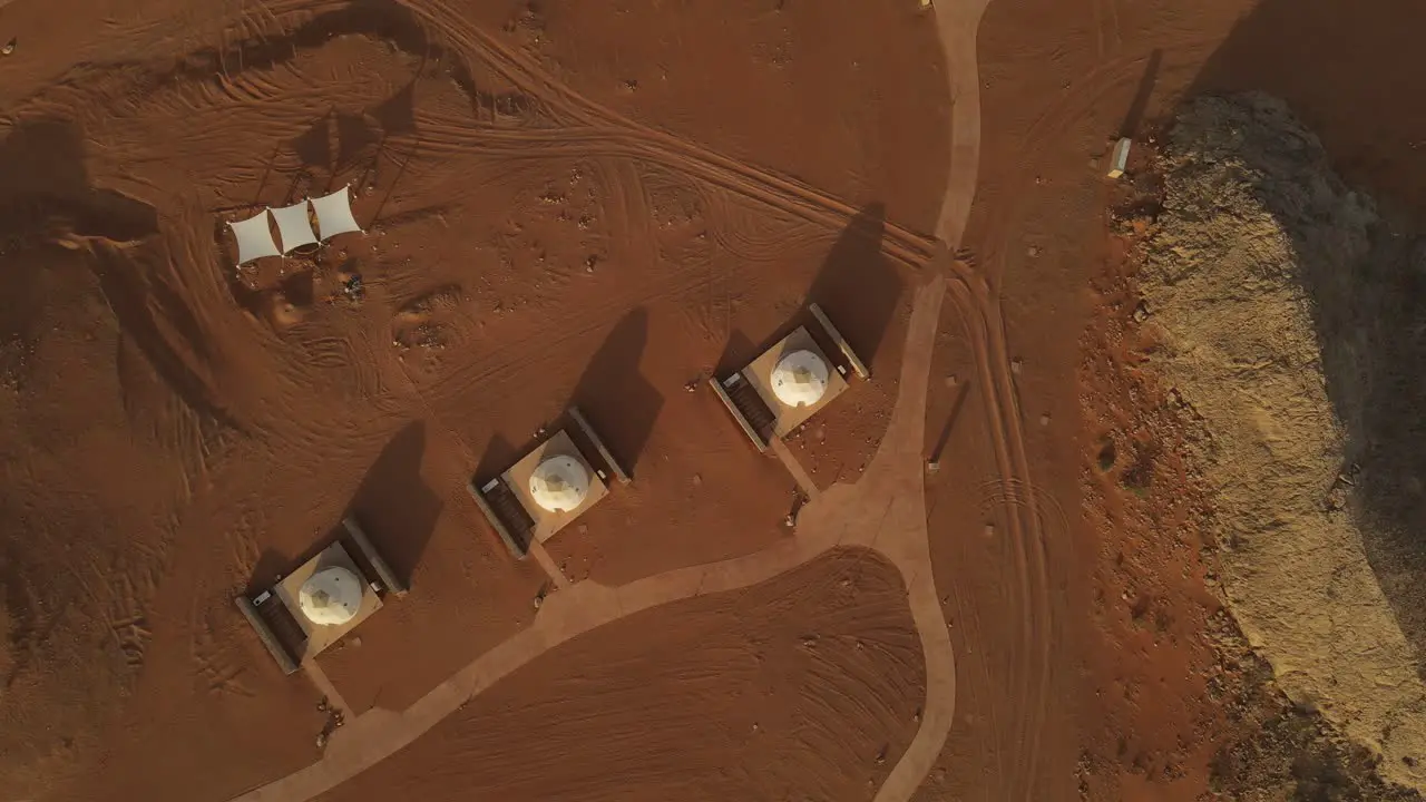 4K Aerial footage of luxury glamping tents along the rock in the Faya Desert in Sharjah United Arab Emirates