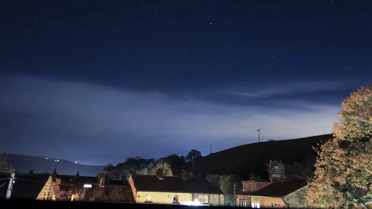 clouds stars and country side  night passing by in the small town of todmorden