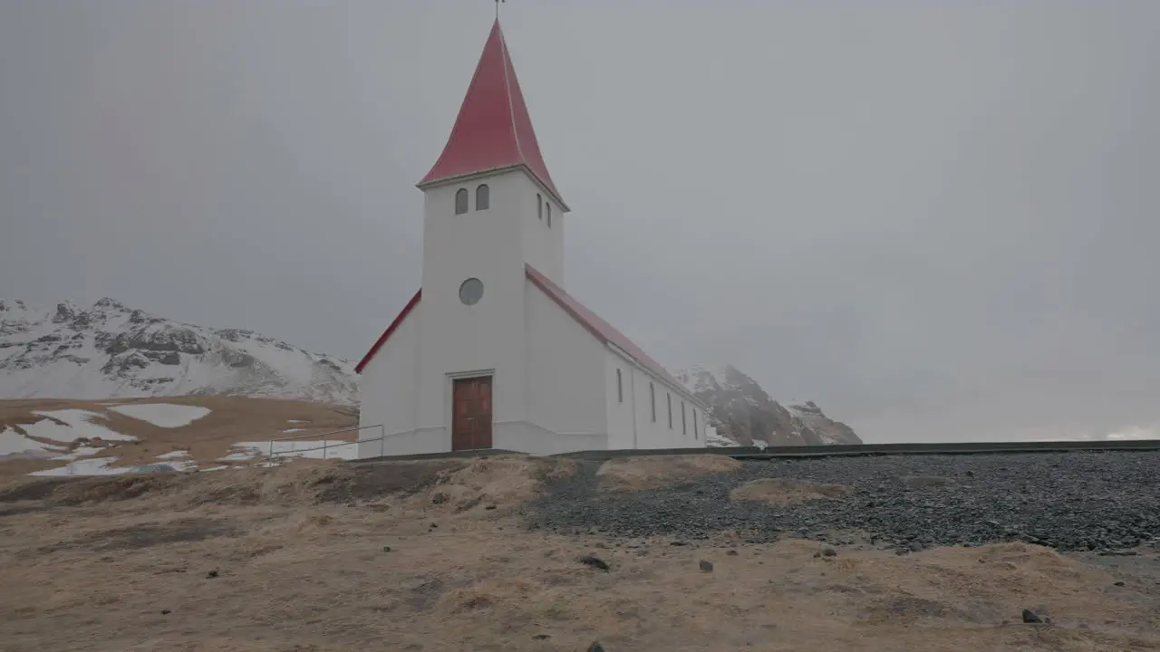 Vík i Myrdal Church Landmark of Iceland on Cold Cloudy Spring Day Parallax Low Angle Shot