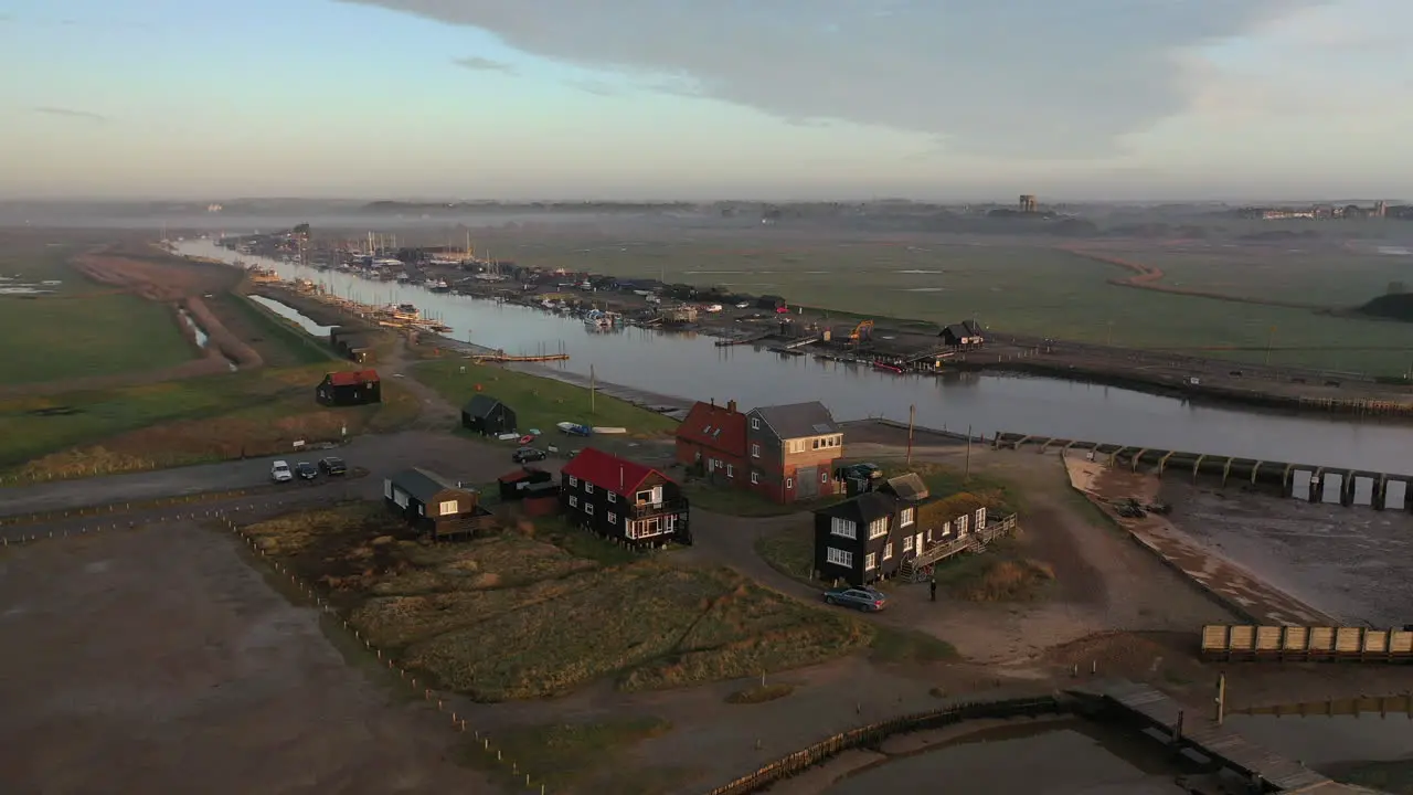 Drone footage of Walberswick harbour suffolk in early morning mist