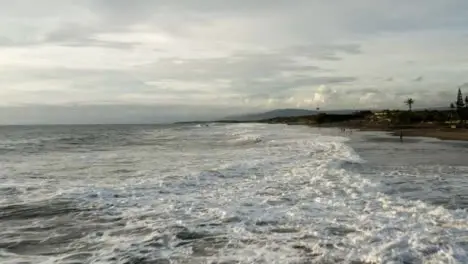 Drone Shot Flying Over Waves at Pigstone Beach