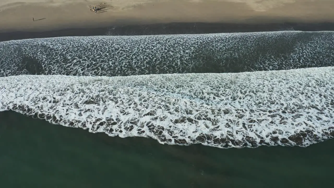 Birds eye view of Waves crashing onto beach Bodega Bay California USA