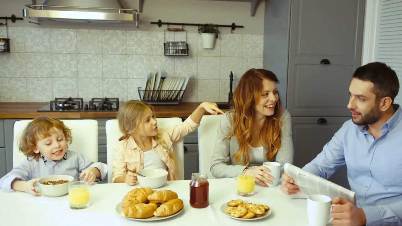 Lovely Family In The Kitchen