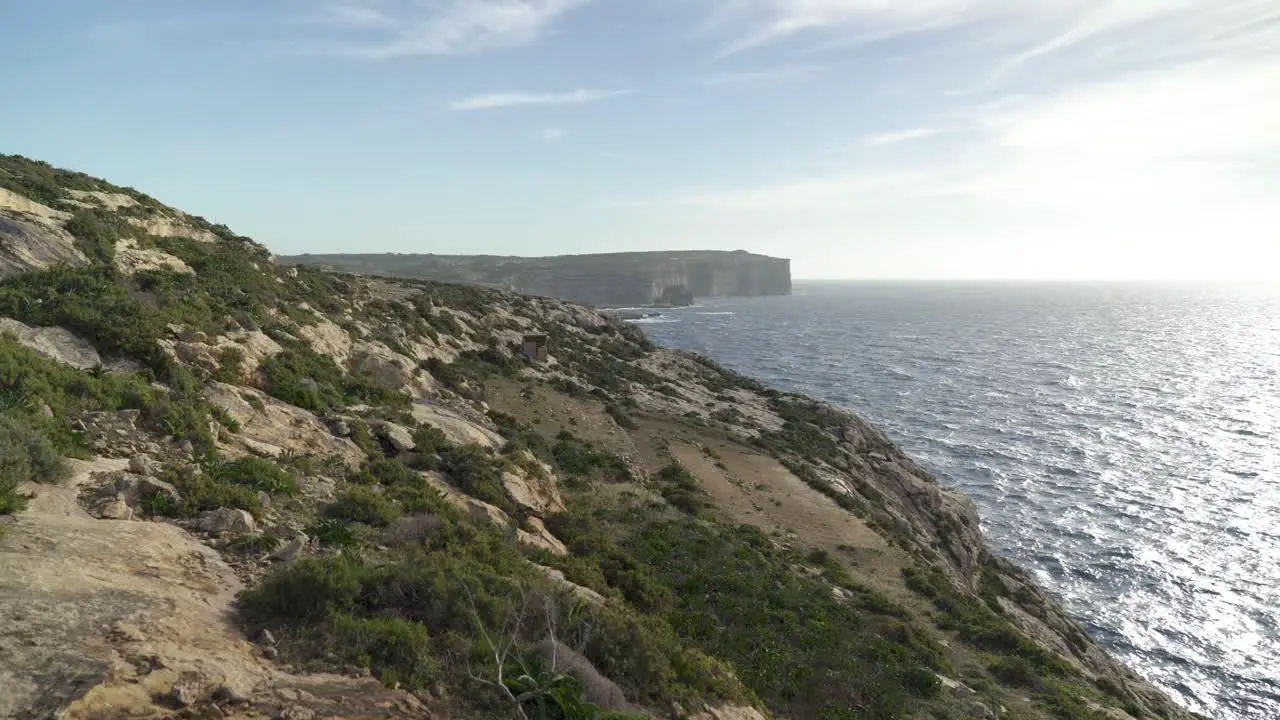 Steep Hills with Greenery near Coastline of Mediterranean Sea in Gozo Island