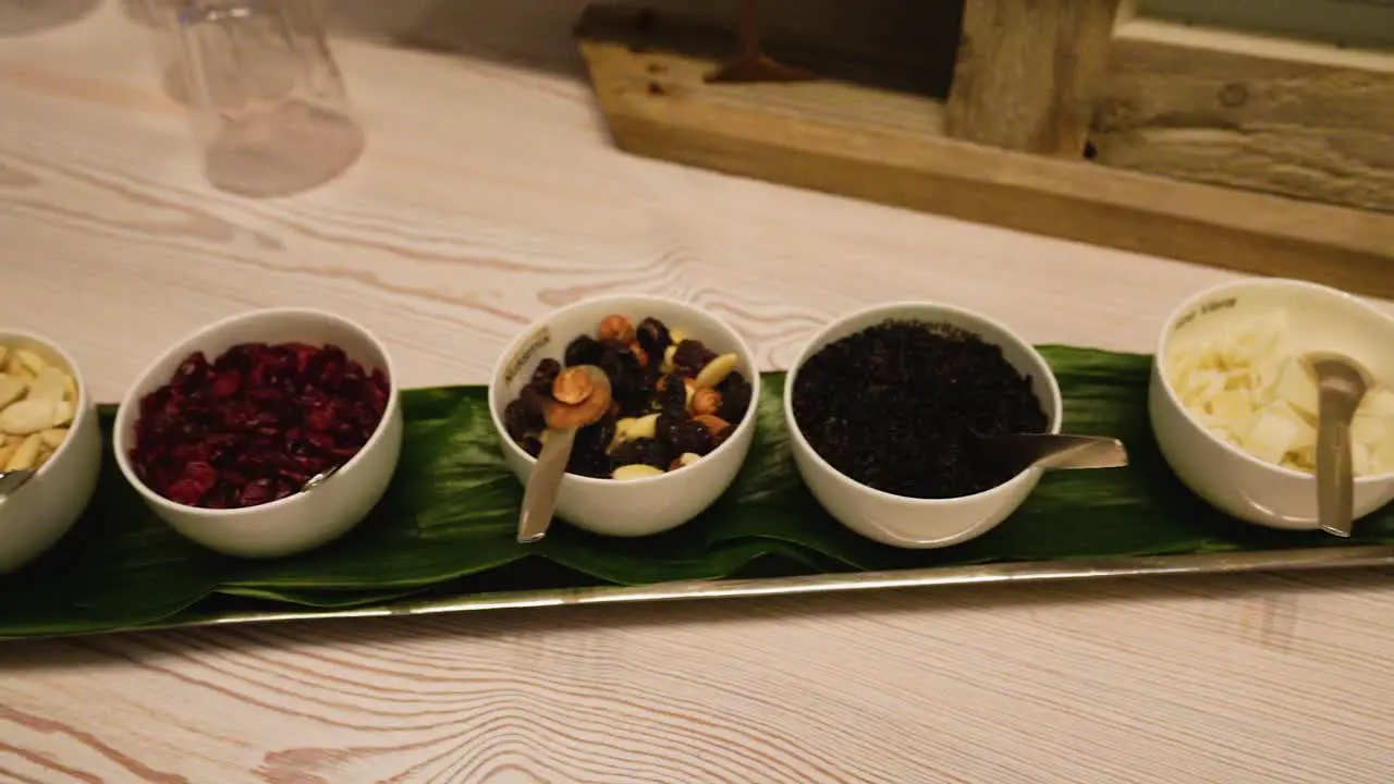 Bowls of food in a hotel breakfast buffet