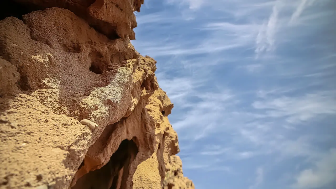 Sedimentary hallow Moroccon coastline rocks timelapse