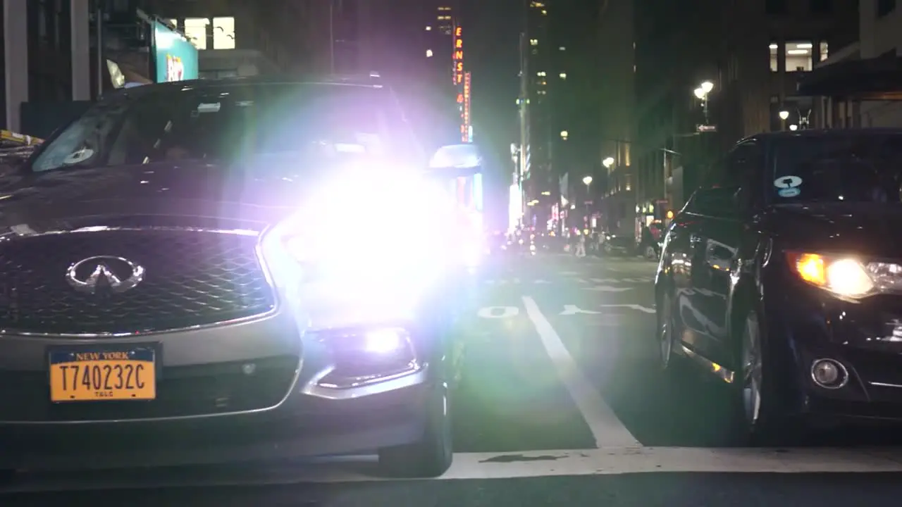 Slow motion New York pedestrian crossing shot following a man walking and cutting through the traffic to take a short cut