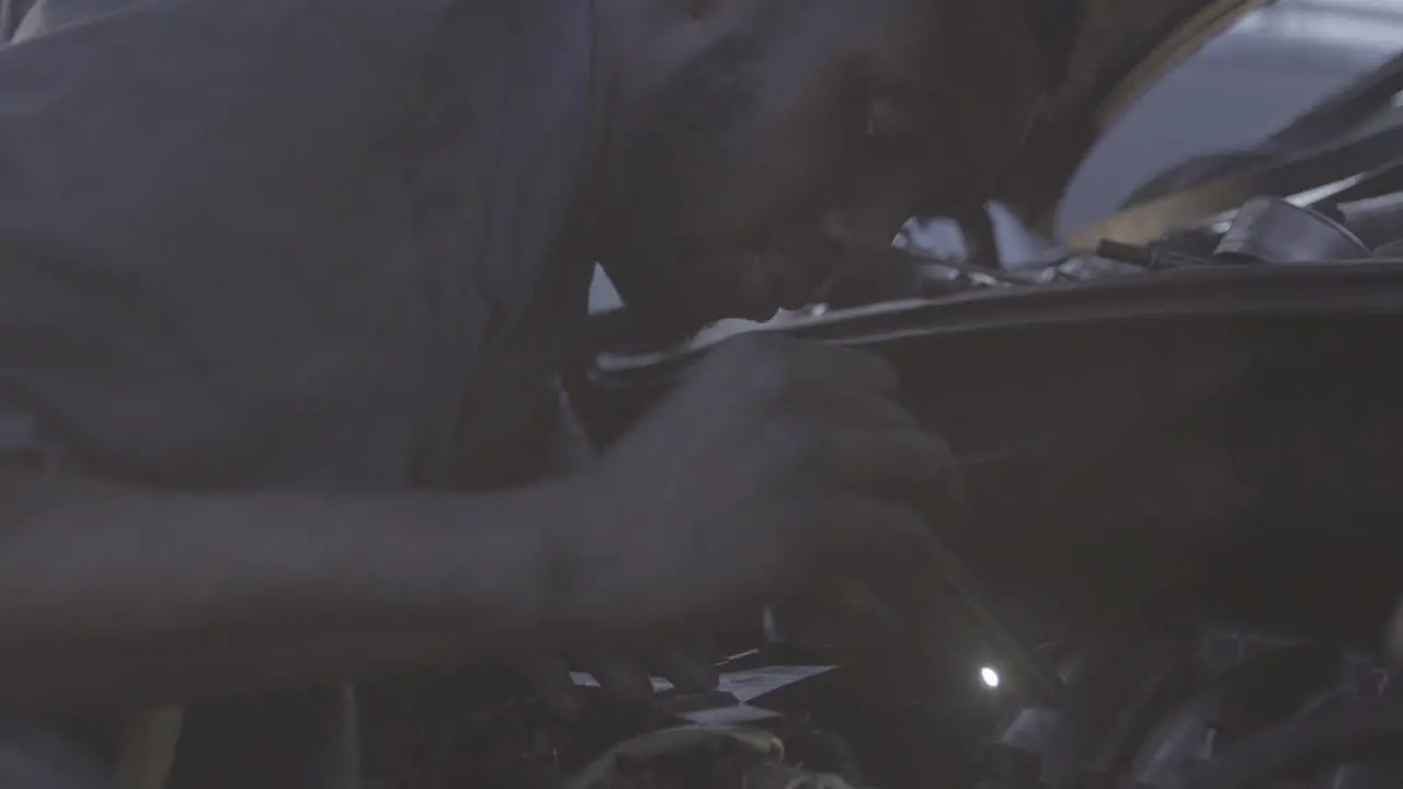 Men Fixing Car Nigeria 01