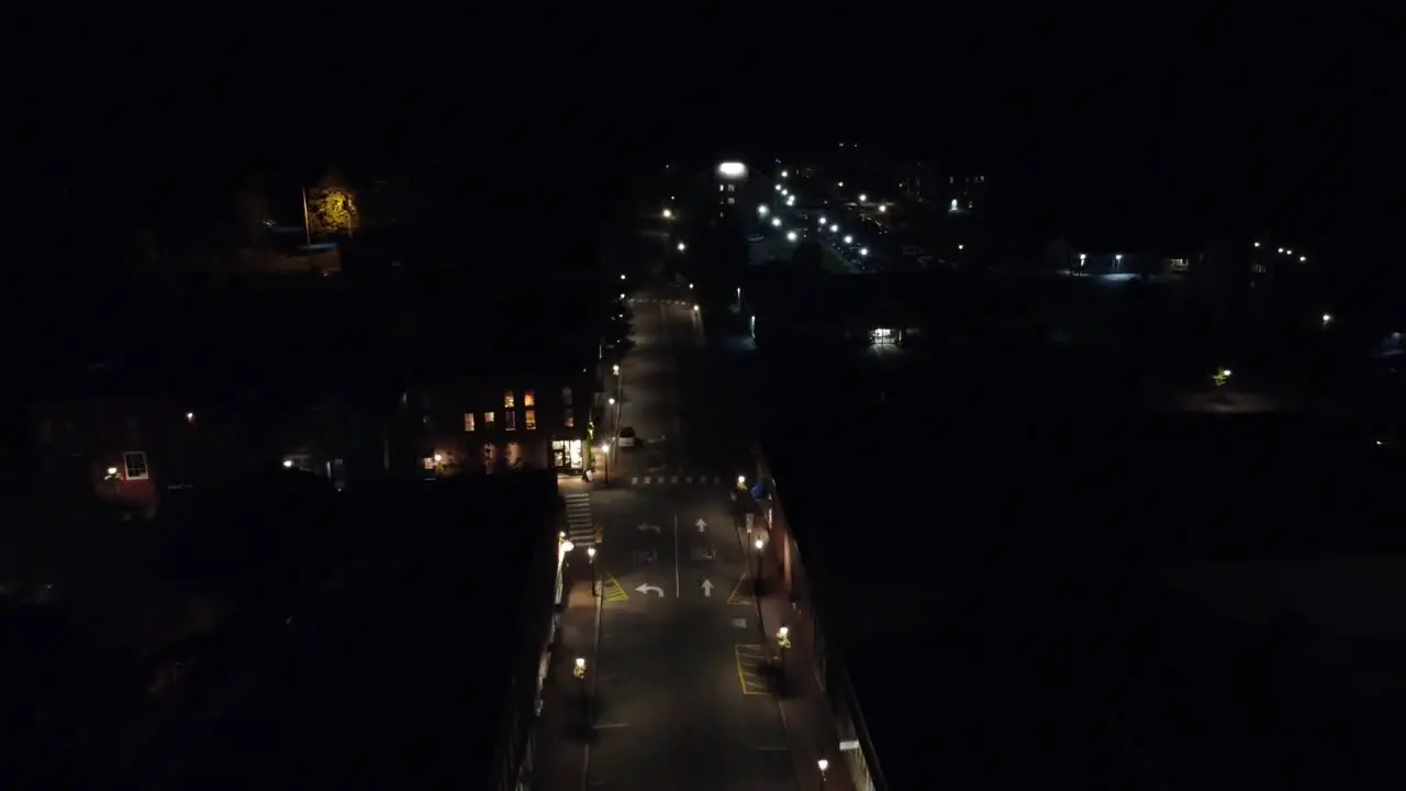 A fly over shot of front street in Bath Maine at night