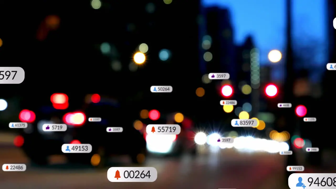 Animation of social media icons on multiple speech bubbles over blurred view of night city traffic